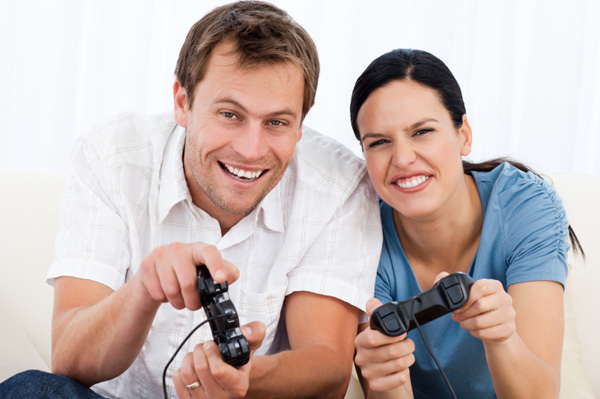 Couple playing video games together